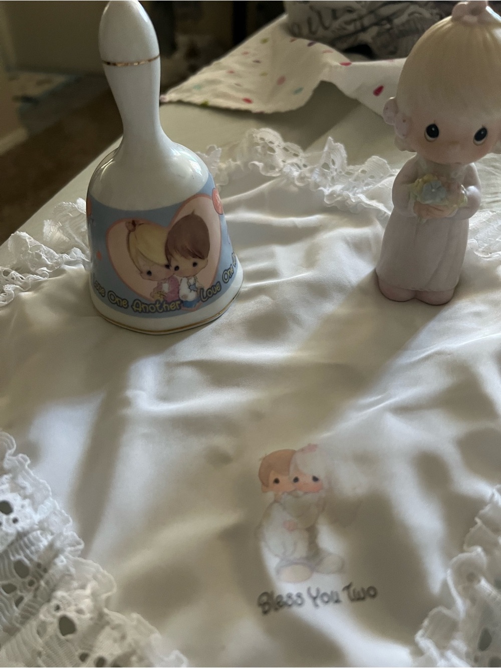 Precious Moments wedding theme White Porcelain Bell & Figurine with doily.
